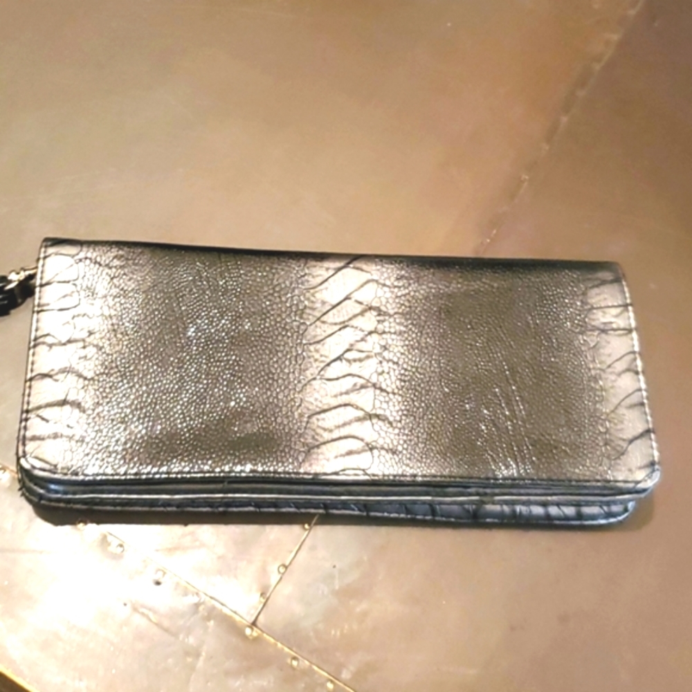 Snake skin style cluth. Carried ONCE* READ